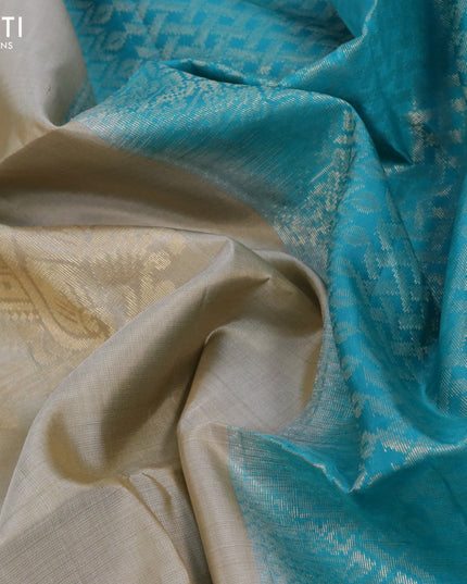 Pure soft silk saree beige and teal blue with silver & gold zari woven buttas in borderless style