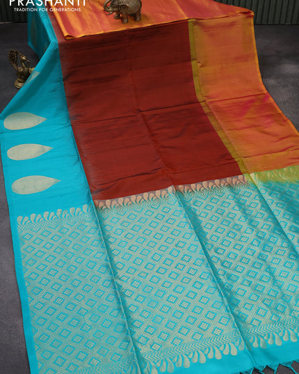 Pure soft silk saree rustic orange and teal blue with plain body and zari woven ganga jamuna border