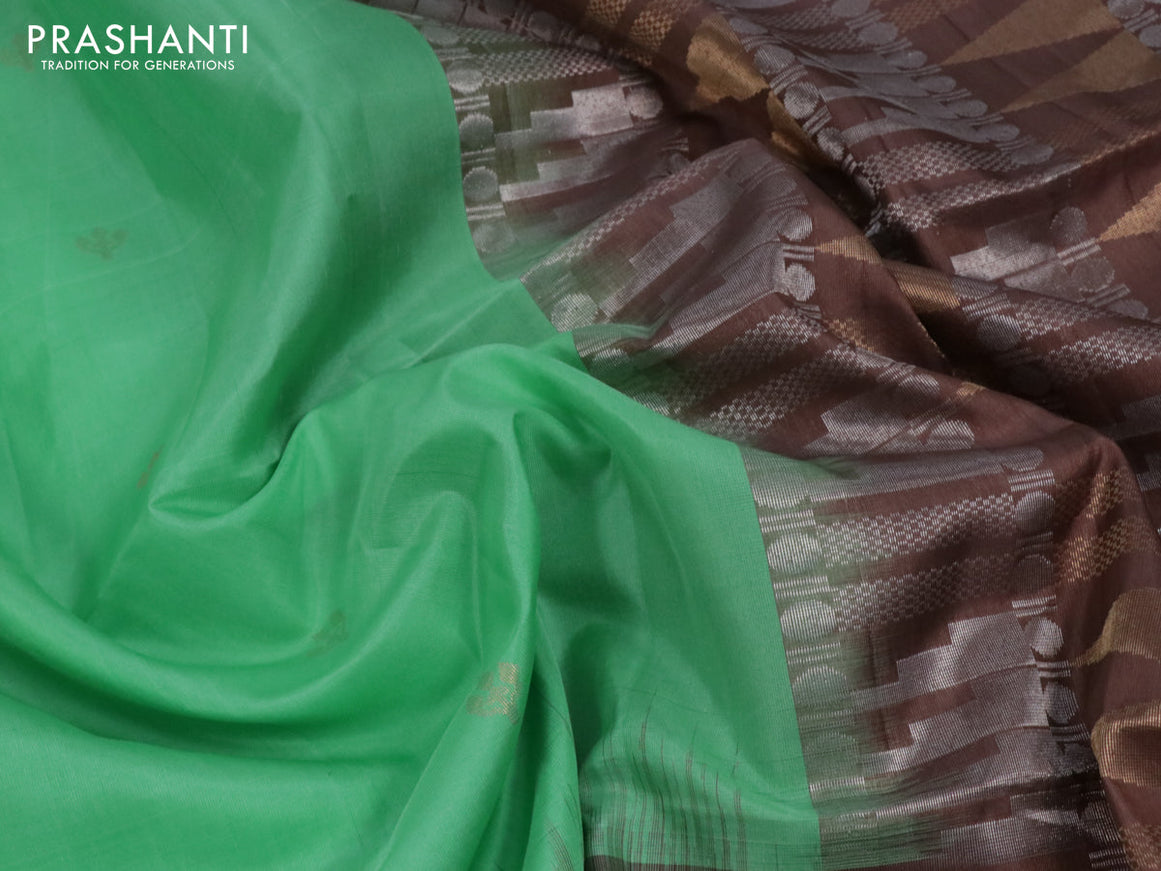Pure soft silk saree teal green and brown with zari woven buttas and long rich zari woven border