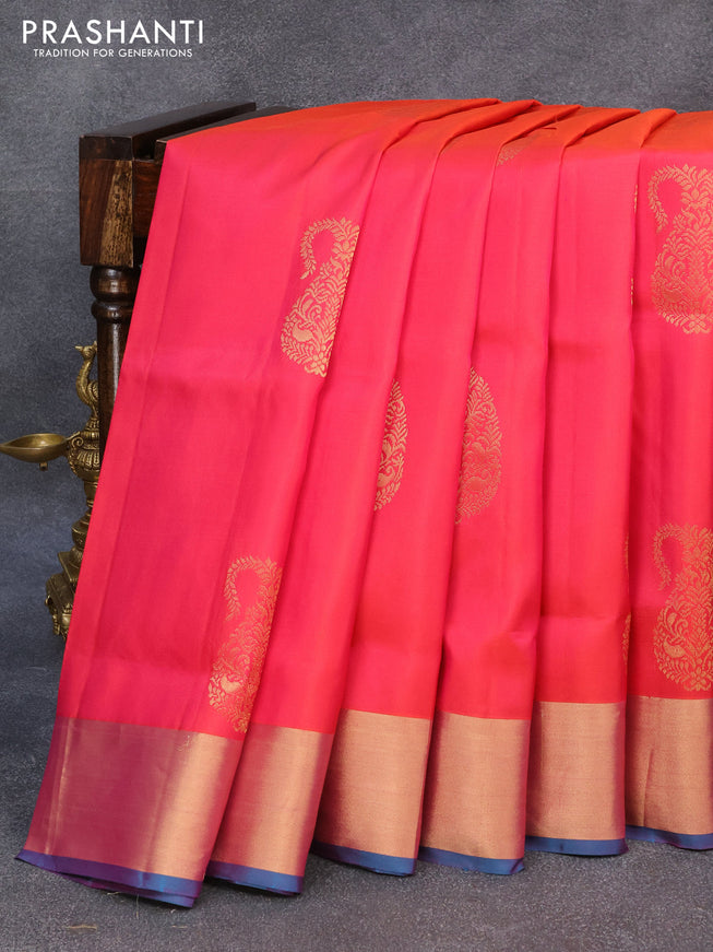 Pure soft silk saree dual shade of pinkish orange and cs blue with paisley zari woven buttas and zari woven border