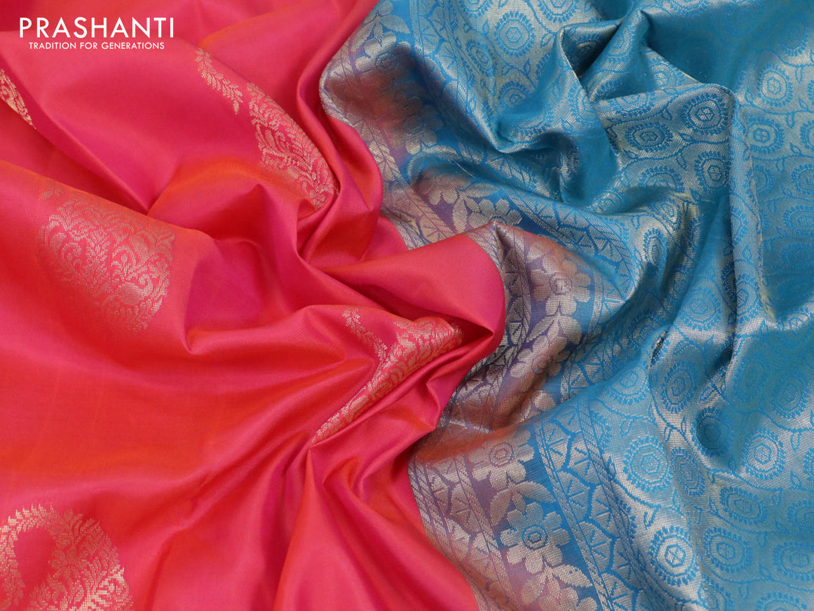 Pure soft silk saree dual shade of pinkish orange and cs blue with paisley zari woven buttas and zari woven border