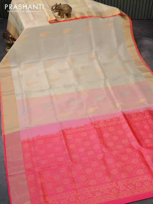 Pure soft silk saree cream and dual shade of pinkish orange with silver & gold zari woven buttas and zari woven border