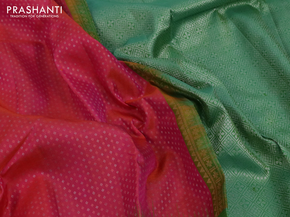 Pure soft silk saree dual shade of pinkish orange and green with allover silver & copper zari weaves and zari woven simple border