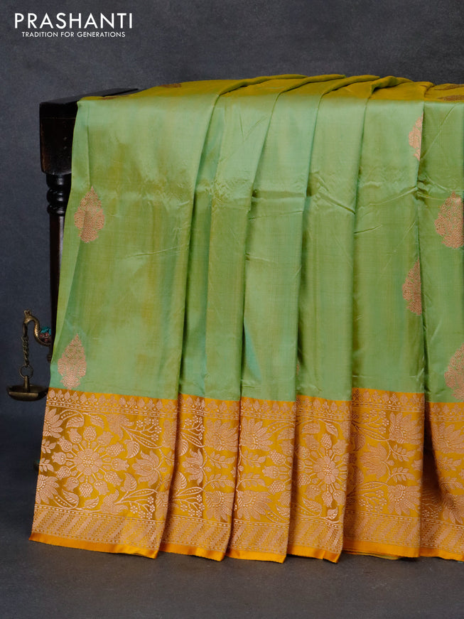 Pure banarasi katan silk saree dual shade of pista green and mango yellow with copper zari woven buttas and zari woven border
