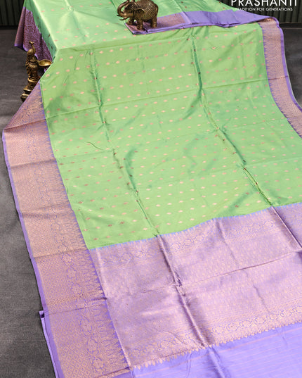 Pure banarasi katan silk saree pastel green and lavender shade with copper zari woven buttas and zari woven border