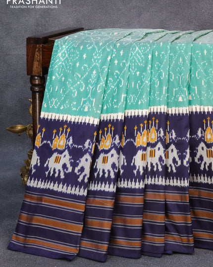 Pochampally silk saree green and navy blue with allover ikat weaves and zari woven simple border