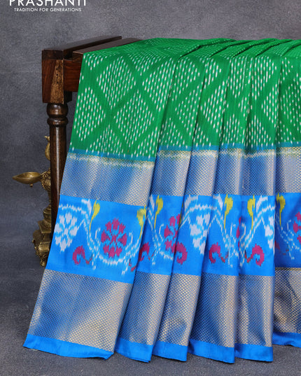 Pochampally silk saree green and cs blue with allover ikat weaves and zari woven border