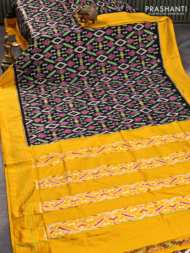 Pochampally silk saree black and mustard yellow with allover ikat weaves and simple border