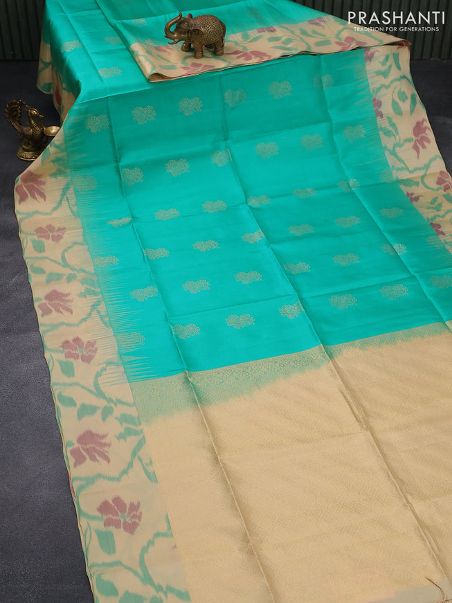 Ikat soft silk saree teal blue and sandal with annam zari woven buttas and ikat style border