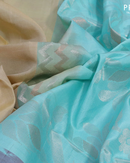 Ikat soft silk saree beige and light blue with silver zari woven buttas and ikat style border