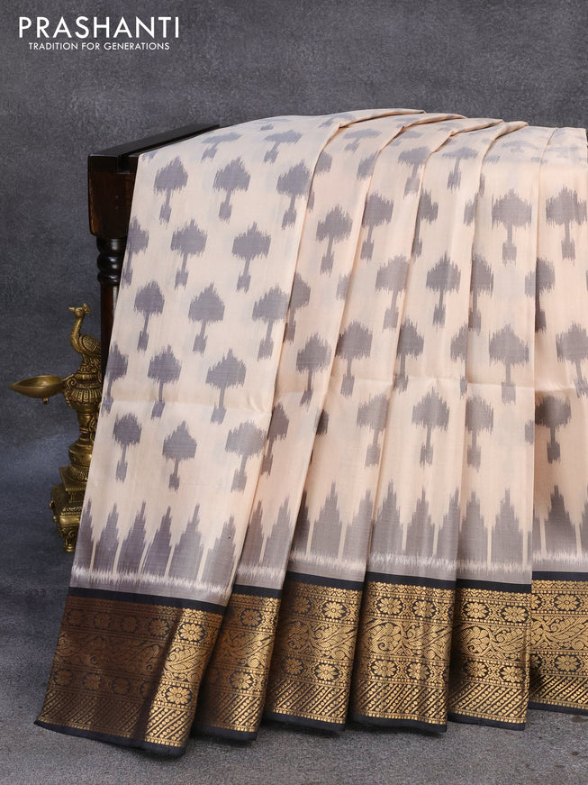 Ikat soft silk saree cream and black with allover ikat weaves and zari woven border