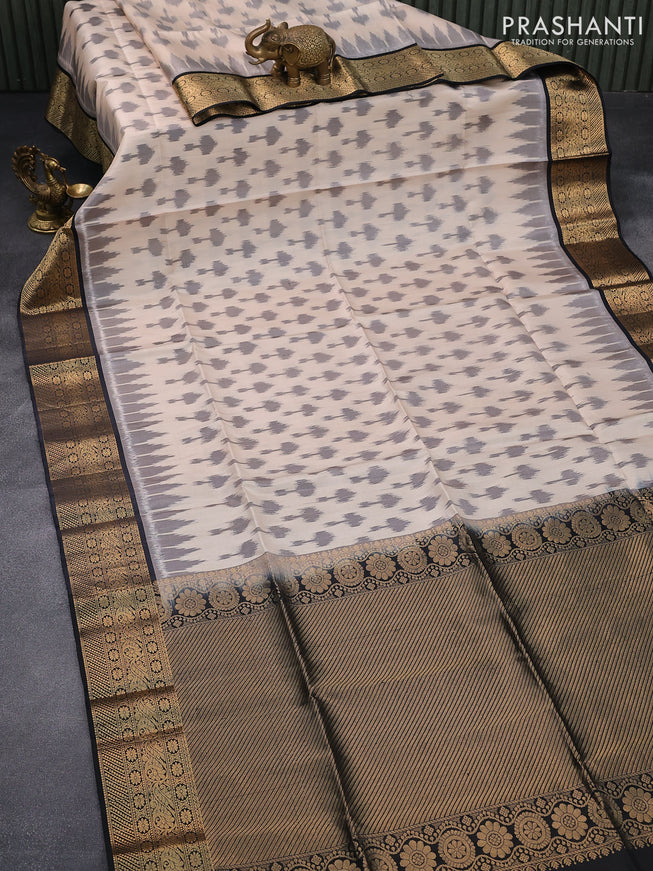 Ikat soft silk saree cream and black with allover ikat weaves and zari woven border