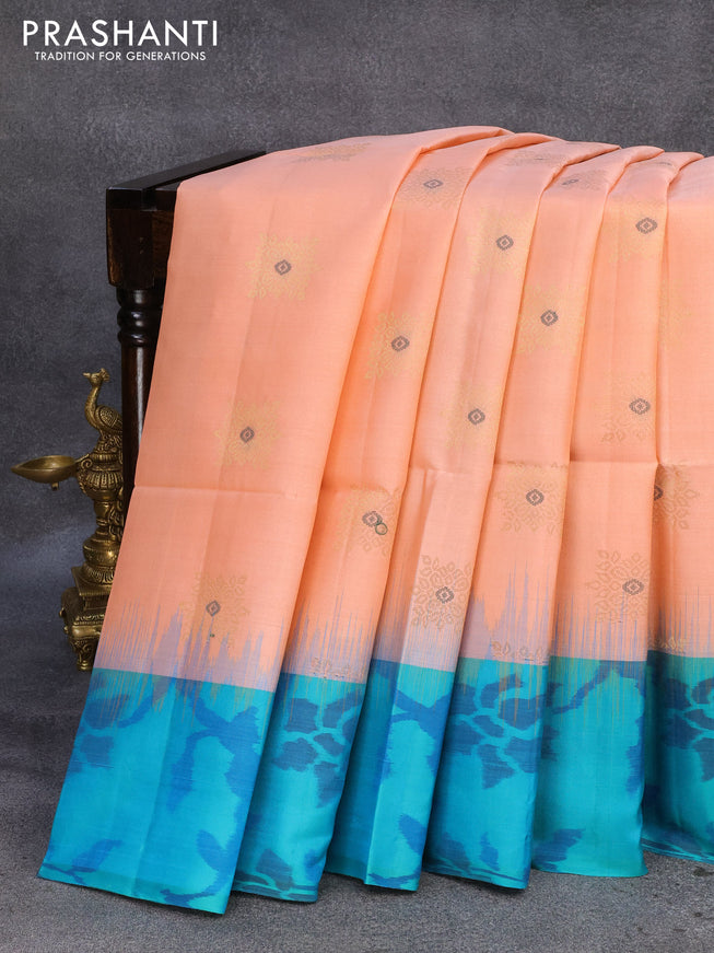 Ikat soft silk saree peach orange and teal blue with zari woven buttas and ikat style border