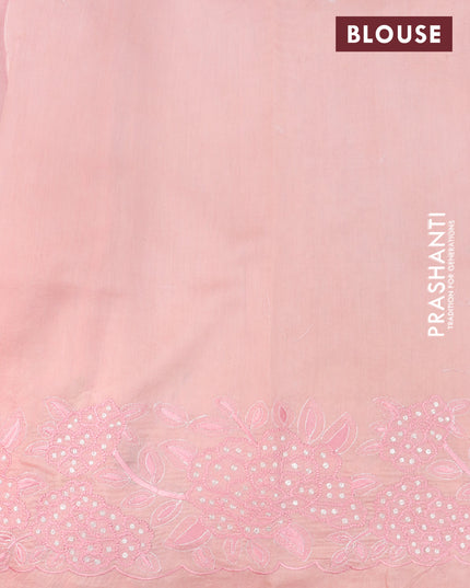 Pure organza silk saree pastel peach with allover mirror work and floral design embroidery work border