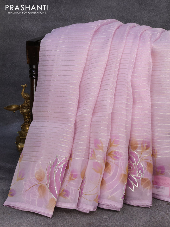 Pure organza silk saree lavender shade with allover silver zari stripes pattern and floral design beaded work border