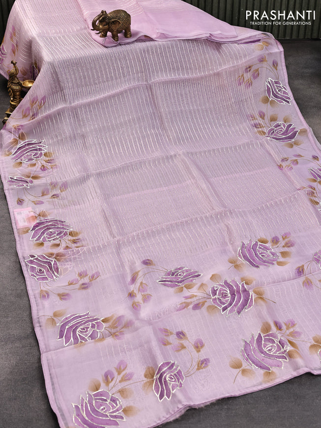Pure organza silk saree lavender shade with allover silver zari stripes pattern and floral design beaded work border
