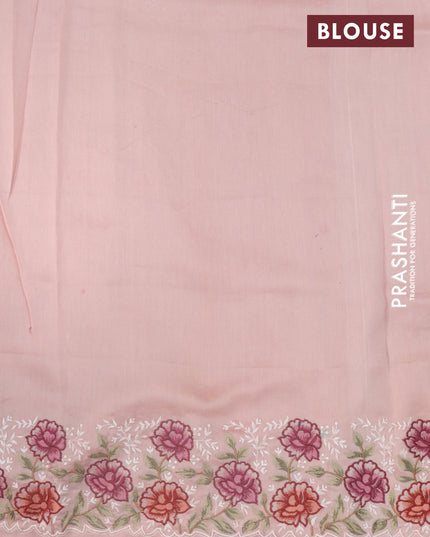 Pure organza silk saree peach shade with plain body and floral design embroidery work border