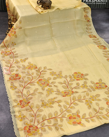 Pure organza silk saree yellow with allover mirror embroidery work and long floral design embroidery work border