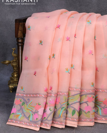 Pure organza silk saree peach orange with floral embroidery work buttas and embroidery work border