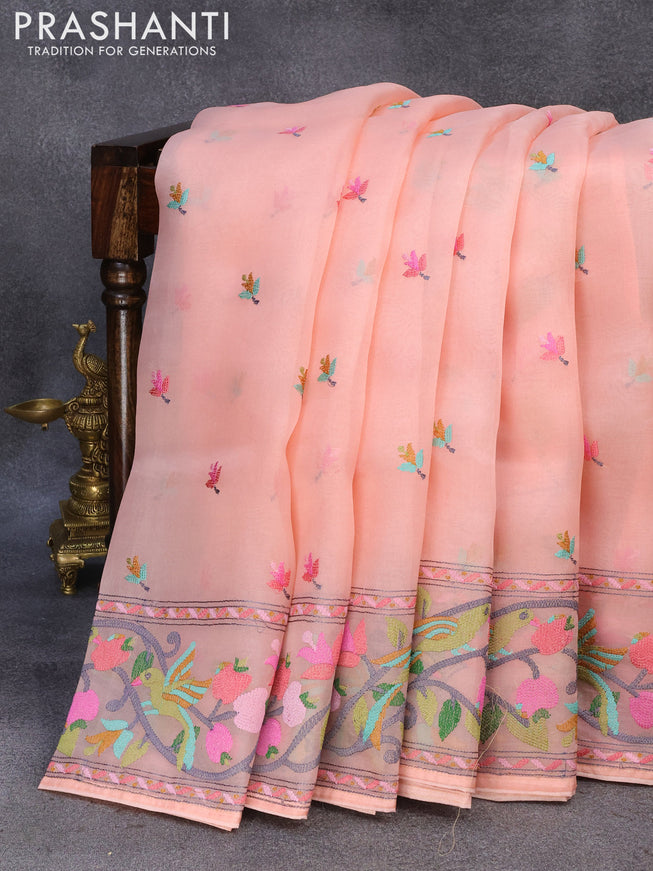 Pure organza silk saree peach orange with floral embroidery work buttas and embroidery work border