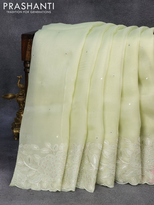 Pure organza silk saree pista green with mirror embroidery work and floral embroidery work border