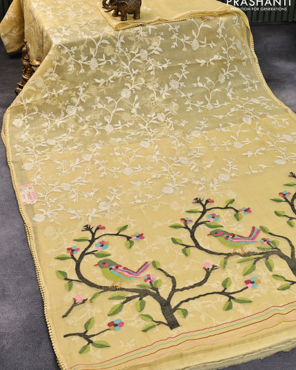 Pure organza silk saree yellow shade with allover floral embroidery work and lace work border