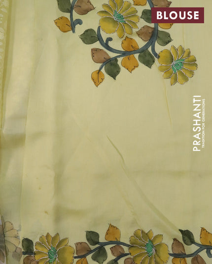 Pure organza silk saree pale yellow and cream with allover embroidery work and tussar kalamkari printed border