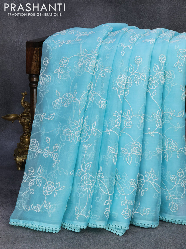 Pure organza silk saree light blue with allover embroidery work and lace work border