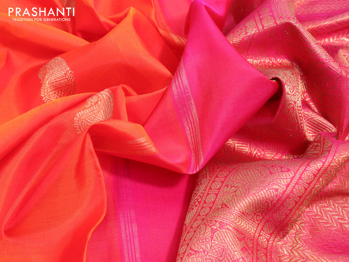 Pure kanjivaram silk saree orange and pink with zari woven paisley buttas and piping border