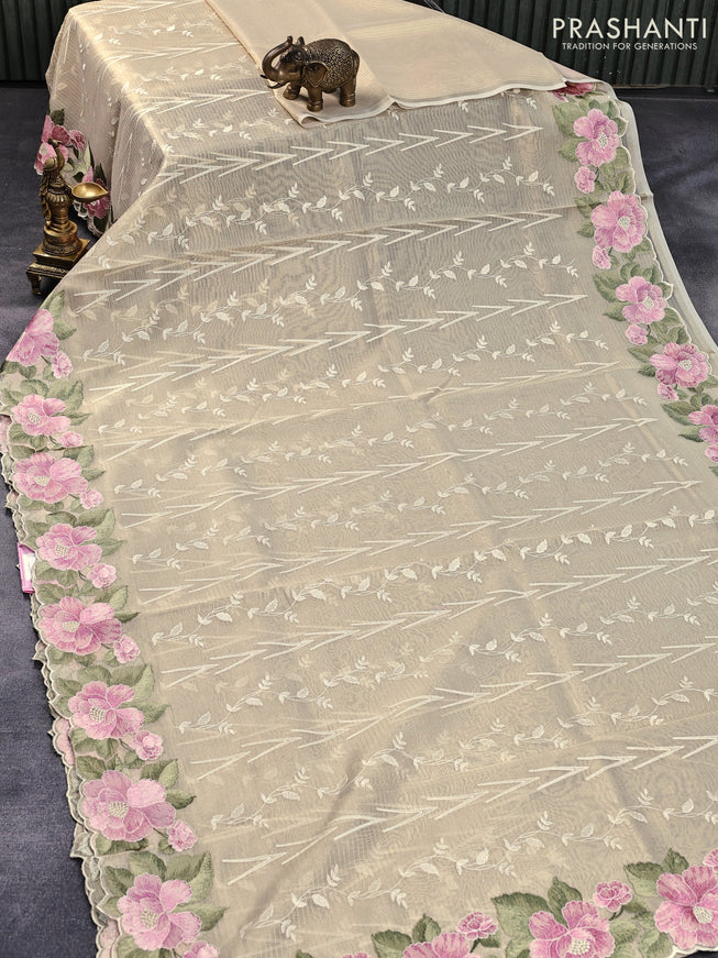Tissue sarees gold with allover embroidery work and floral embroidery work border