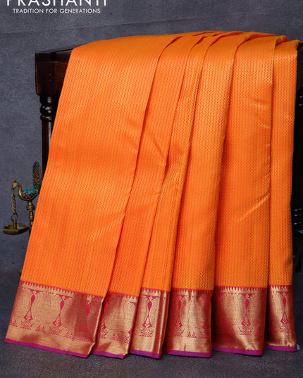 Pure kanjivaram silk saree orange and dual shade of purple with allover self emboss and zari woven border