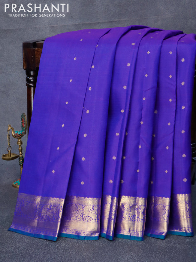 Pure kanjivaram silk saree blue and green with allover zari woven buttas and annam zari woven border