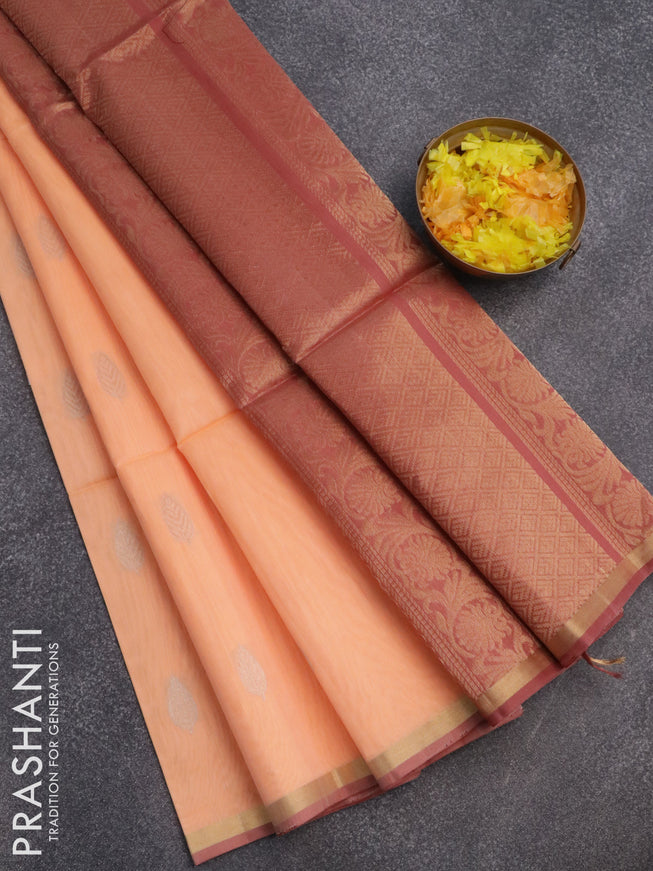 Kora silk cotton saree peach orange and pastel maroon with silver & gold zari woven leaf buttas and zari woven piping border