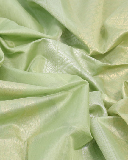 Kora silk cotton saree pastel green with zari woven paisley buttas in borderless style