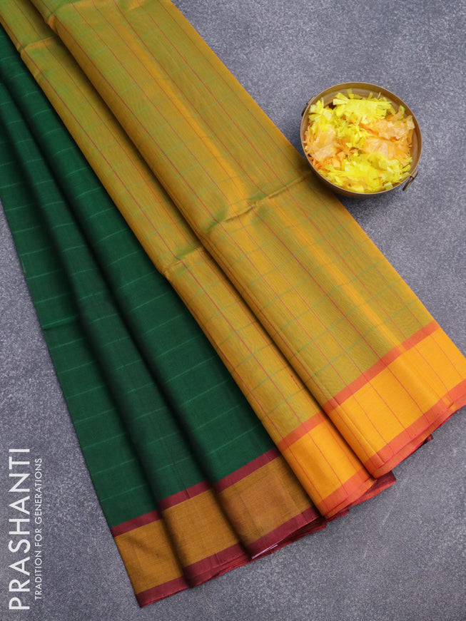 Kora silk cotton saree green and yellow with allover stripes pattern and simple border