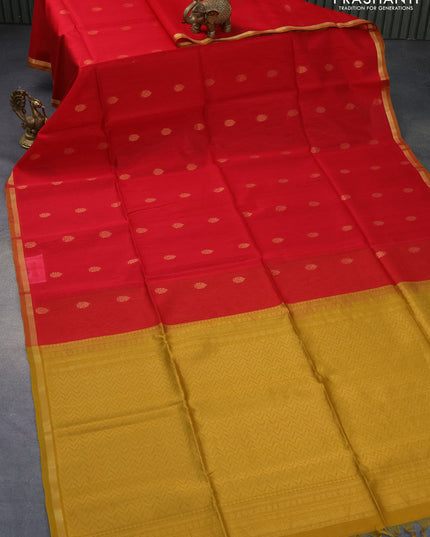 Kora silk cotton saree red and mustard shade with allover zari woven buttas and zari woven piping border
