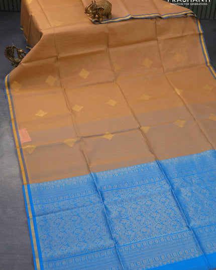 Kora silk cotton saree sandal and cs blue with zari woven buttas and zari woven piping border