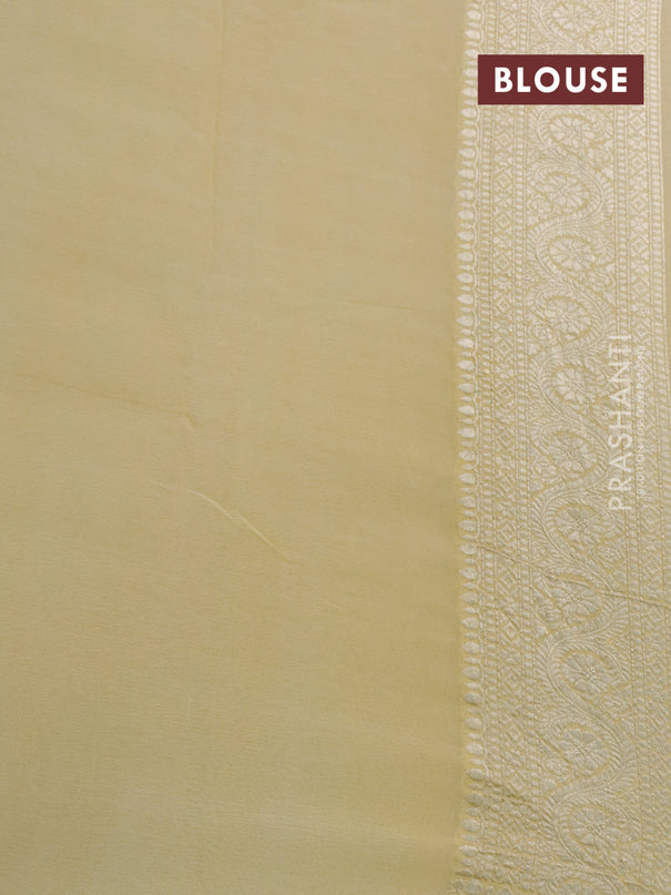 Pure banarasi georgette silk saree multi colour and pale yellow with allover zari weaves and zari woven border