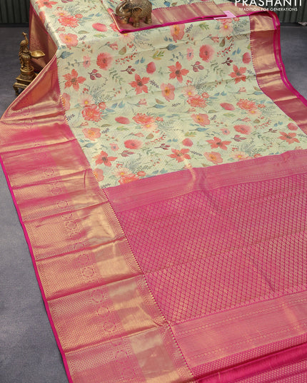 Pure kanjivaram silk saree pastel green and pink with allover floral digital prints & zari weaves and zari woven border