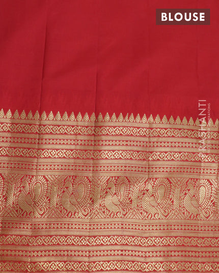 Pure gadwal silk saree light blue and red with allover zari woven buttas and temple design long annam zari woven border