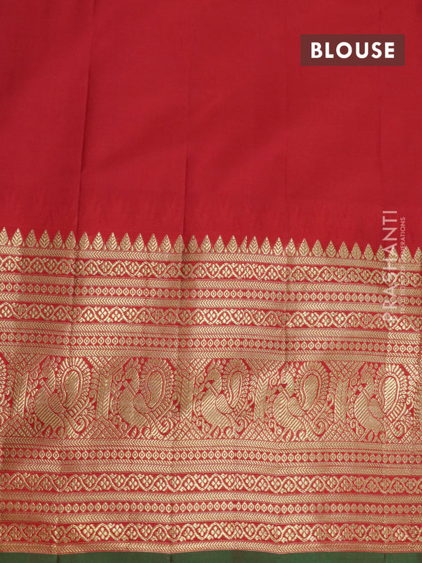 Pure gadwal silk saree light blue and red with allover zari woven buttas and temple design long annam zari woven border