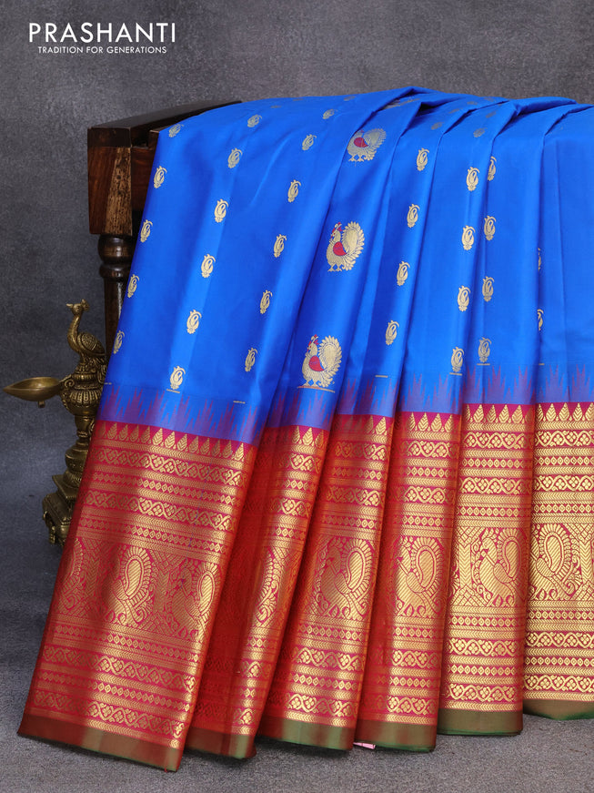 Pure gadwal silk saree cs blue and purple with zari woven annam buttas and long annam zari woven border
