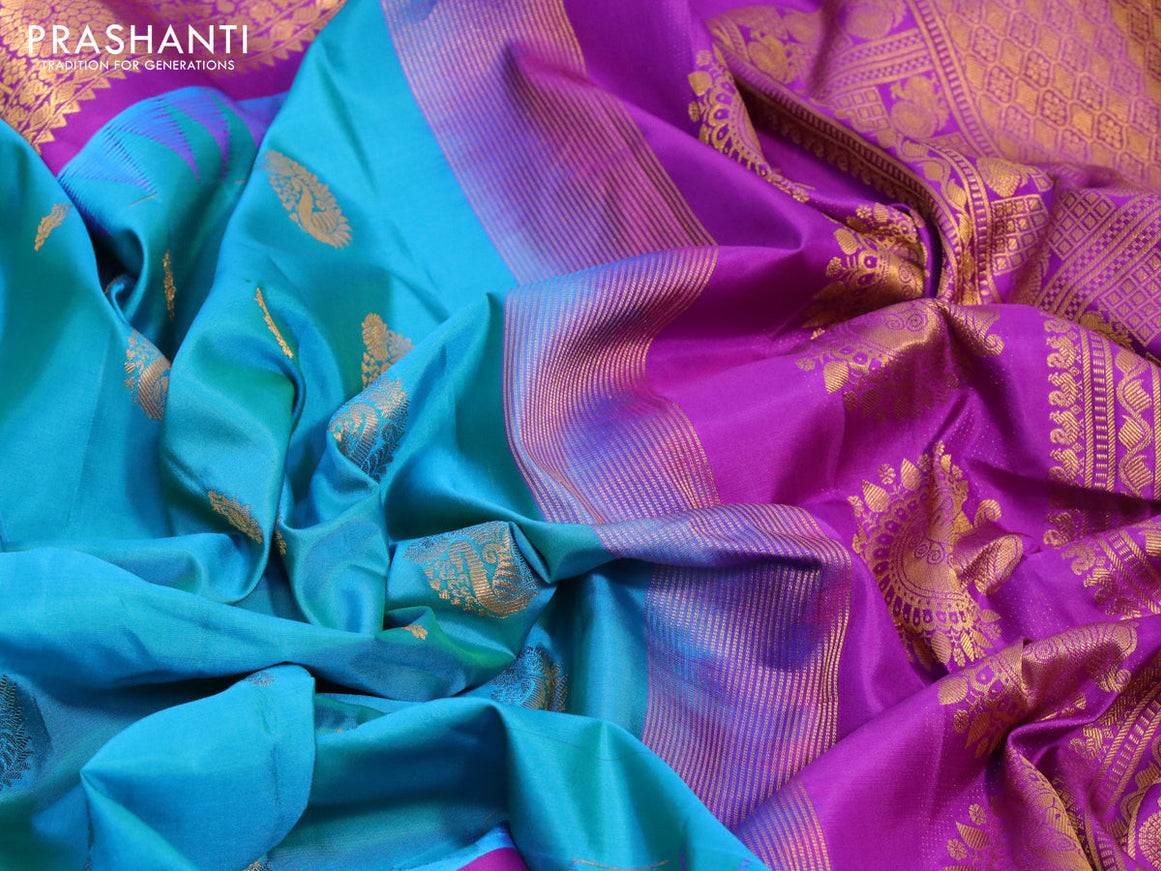 Pure gadwal silk saree dual shade of cs blue and purple with zari woven buttas and temple design long zari woven border