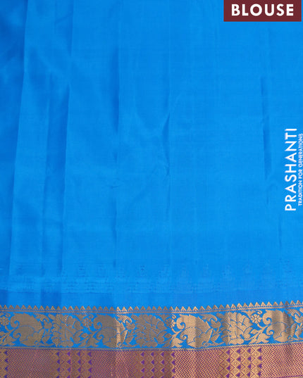Pure gadwal silk saree elaichi green and cs blue with allover zari woven buttas and temple design zari woven border