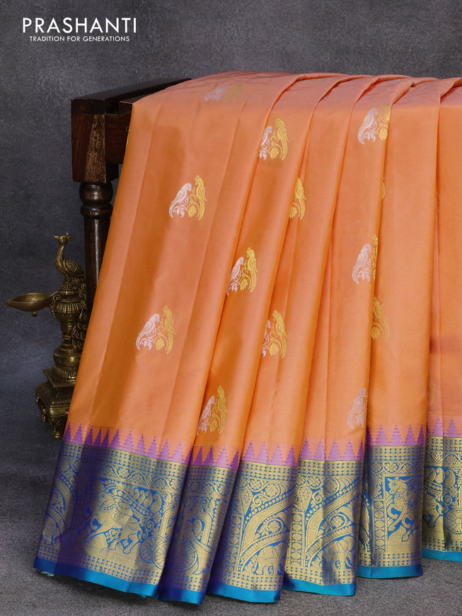 Pure gadwal silk saree peach orange and blue with silver & gold zari woven parrot buttas and temple design zari woven border