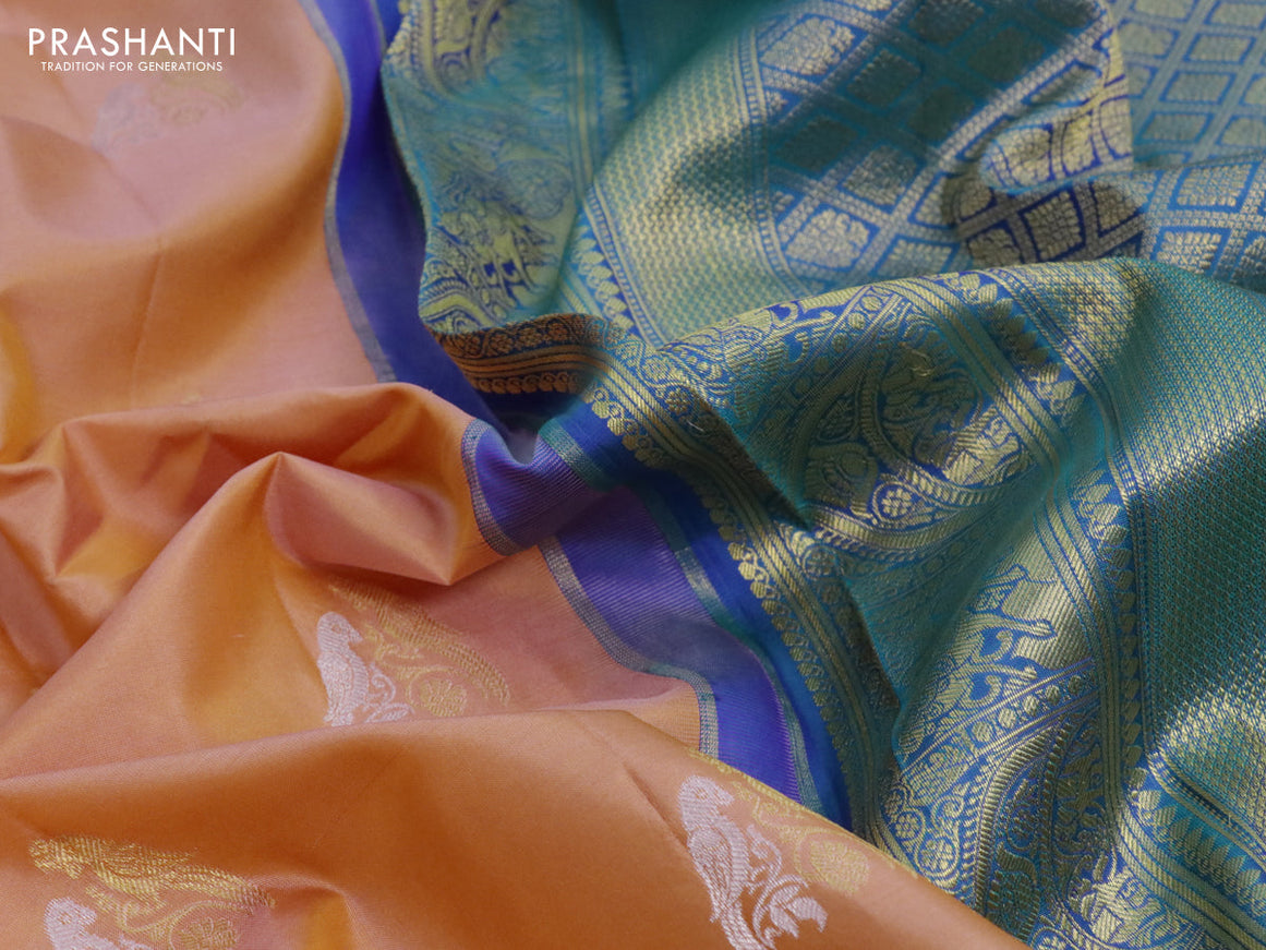 Pure gadwal silk saree peach orange and blue with silver & gold zari woven parrot buttas and temple design zari woven border