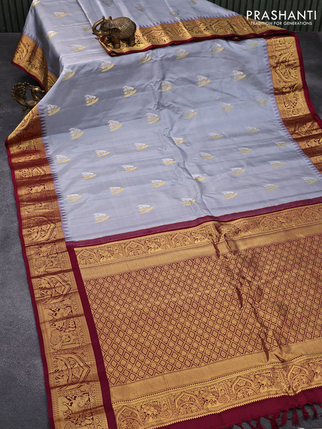 Pure gadwal silk saree grey and dark magenta pink with silver & gold zari woven parrot buttas and temple design zari woven border
