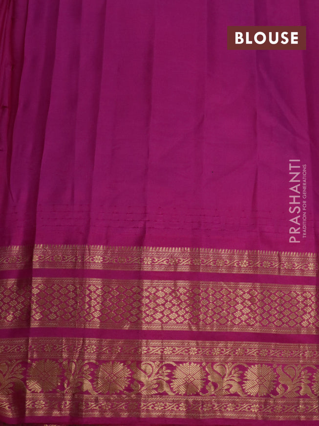 Pure gadwal silk saree green and pink with allover zari woven butta weaves and temple design zari woven border