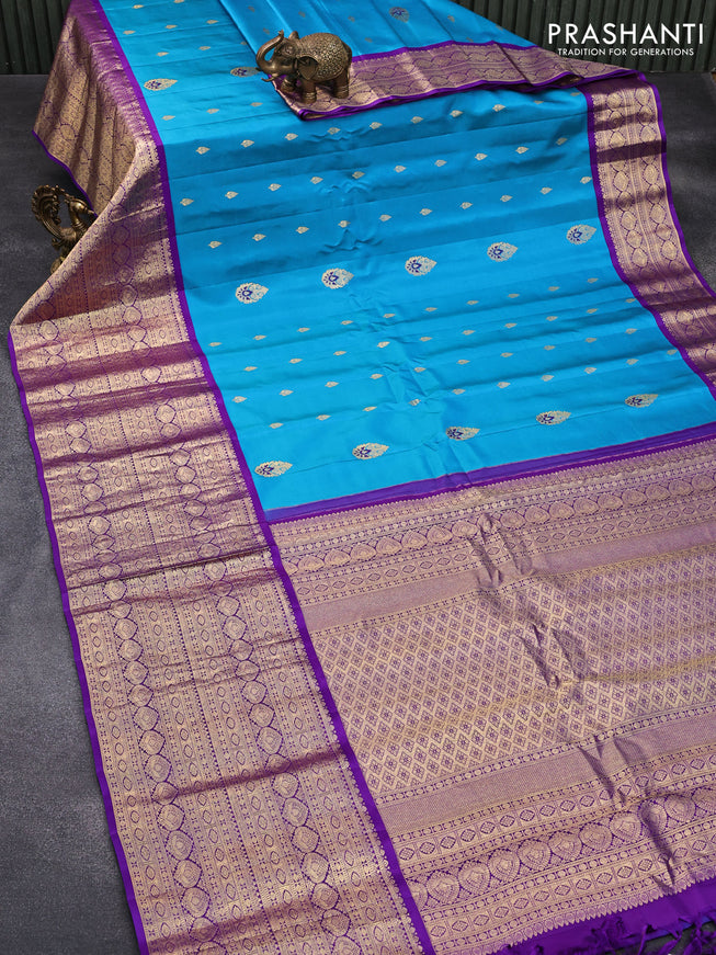 Pure gadwal silk saree cs blue and violet with zari woven buttas and long zari woven border