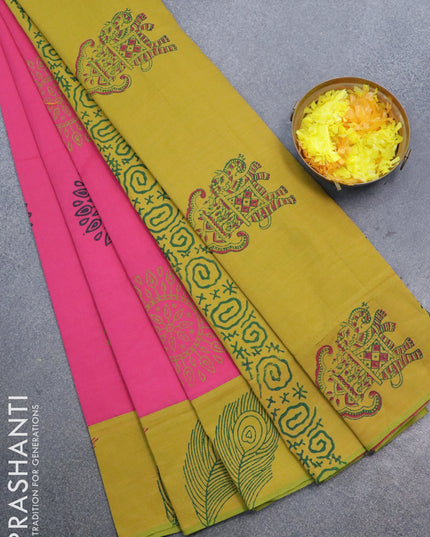 Poly cotton saree pink and mustard green shade with hand block prints and printed border